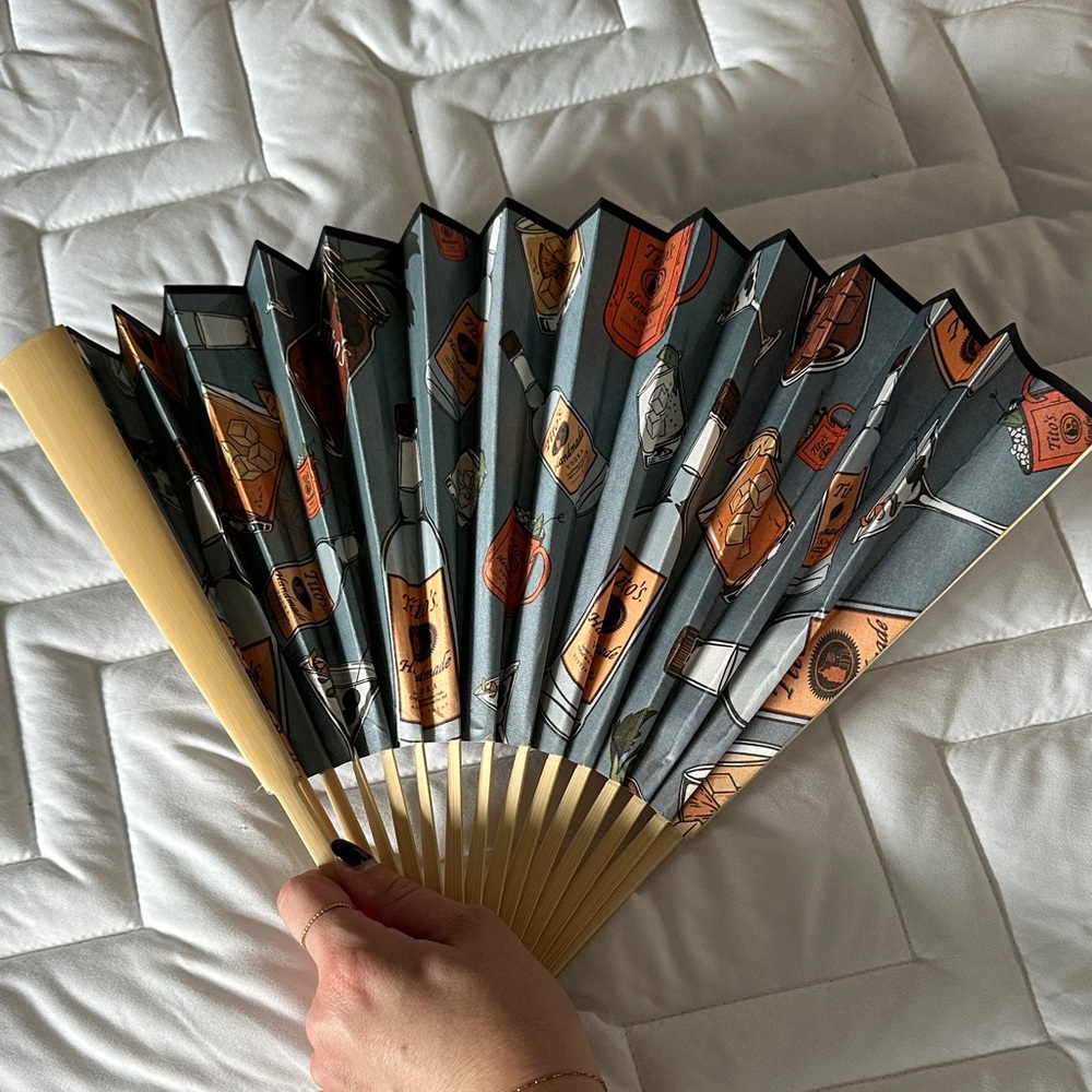 Stylish Folding Hand Fan with Bottle Design